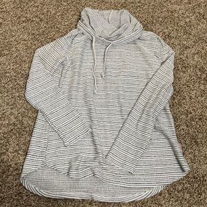 Staccato tunic vowel neck top